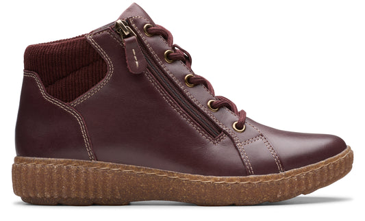 A burgundy leather ankle boot with laces and a side zipper.
