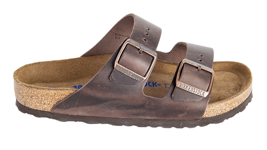 Leather sandal with two adjustable straps and metal buckles.