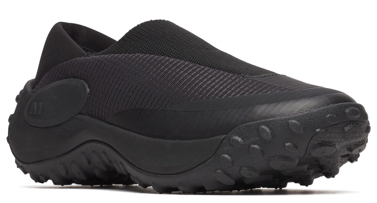 Black slip-on shoe with a thick treaded sole.
