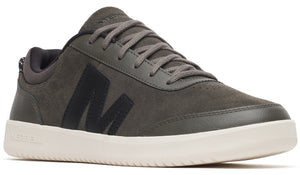Low-top sneaker, dark green suede with a large black M on the side and white sole.
