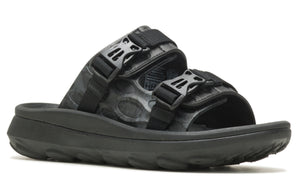 A black slide sandal featuring two straps with adjustable buckles.