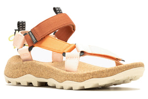 Side view of a multi-strap sandal with a cork footbed and beige sole.