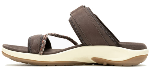 Side view of a brown sandal with a cream-colored sole and two straps, one of which is braided.