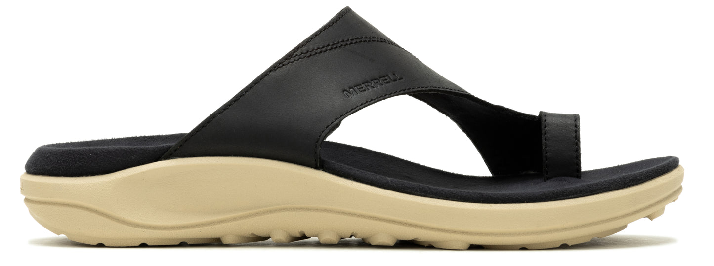 A black slide sandal with a beige sole.