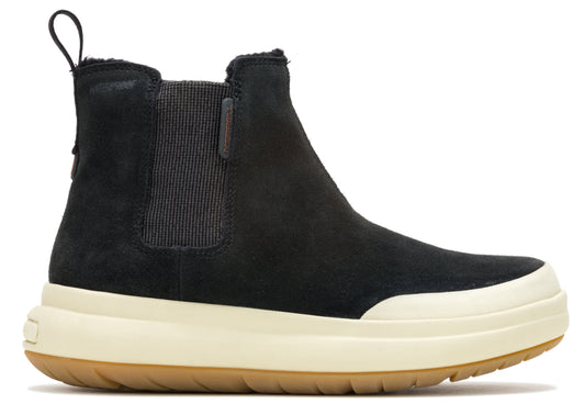 Black suede Chelsea boot with a light beige platform sole and a brown outsole. The boot has an elastic side panel and a pull tab at the heel.