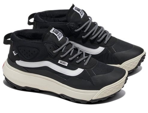 A pair of black high-top sneakers with a white stripe on the side, white laces, and a thick off-white sole with black tread.