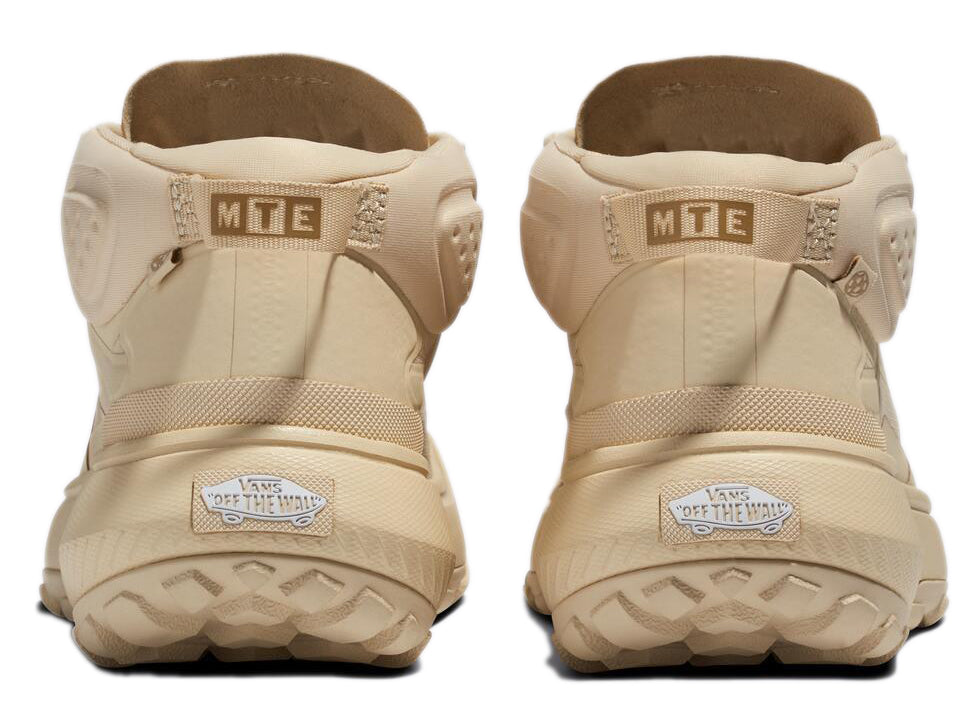 Back view of light beige high top sneakers featuring "MTE" and the brand's logo on the heel.