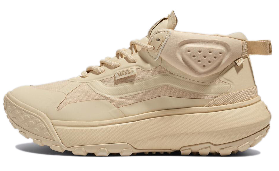 Beige high-top sneaker with thick lug sole, lace-up closure, and "VANS" tag.