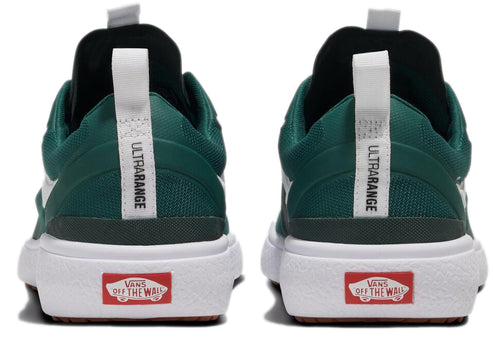 A pair of green sneakers seen from the back, featuring white midsoles, gum outsoles, white pull-tabs with "ULTRARANGE" text, and red "VANS OFF THE WALL" logos.