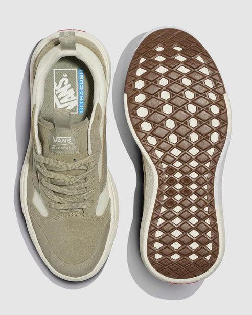 Top down shot of a gray sneaker and brown sole. The insole has text "VANS ULTRACUSH".