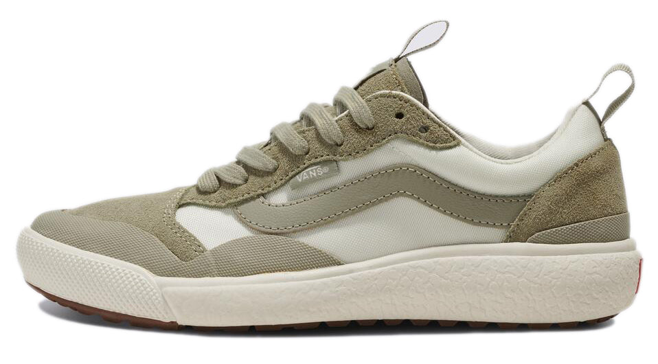 A low-top tan sneaker with off-white accents, laces, and thick sole.