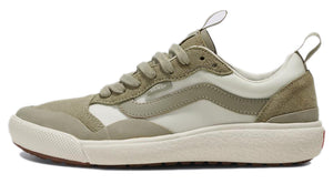 A low-top tan sneaker with off-white accents, laces, and thick sole.