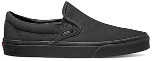 A black slip-on shoe with a black sole, featuring a Vans tag on the side.