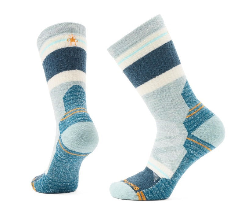 Two striped socks that are grey, light-blue, dark-blue and cream-colored