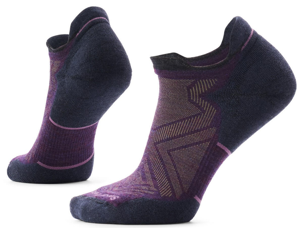 A pair of purple and black low-cut athletic socks with geometric patterns and reinforced heel and toe sections against a plain white background.