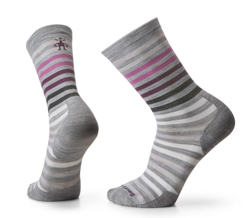 Pair of gray striped socks with colorful bands near the top.