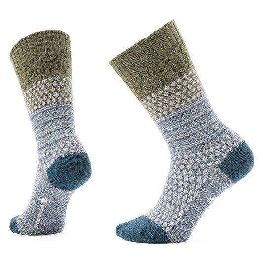 Two socks with an olive green top, a grey and white diamond pattern, grey ribbed section, and teal heel and toe.