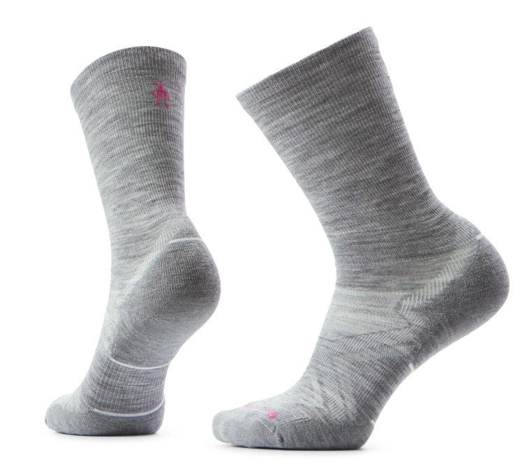 Two gray wool socks, one facing left and one facing right, with pink logo.