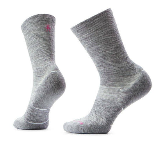 Two gray wool socks, one facing left and one facing right, with pink logo.