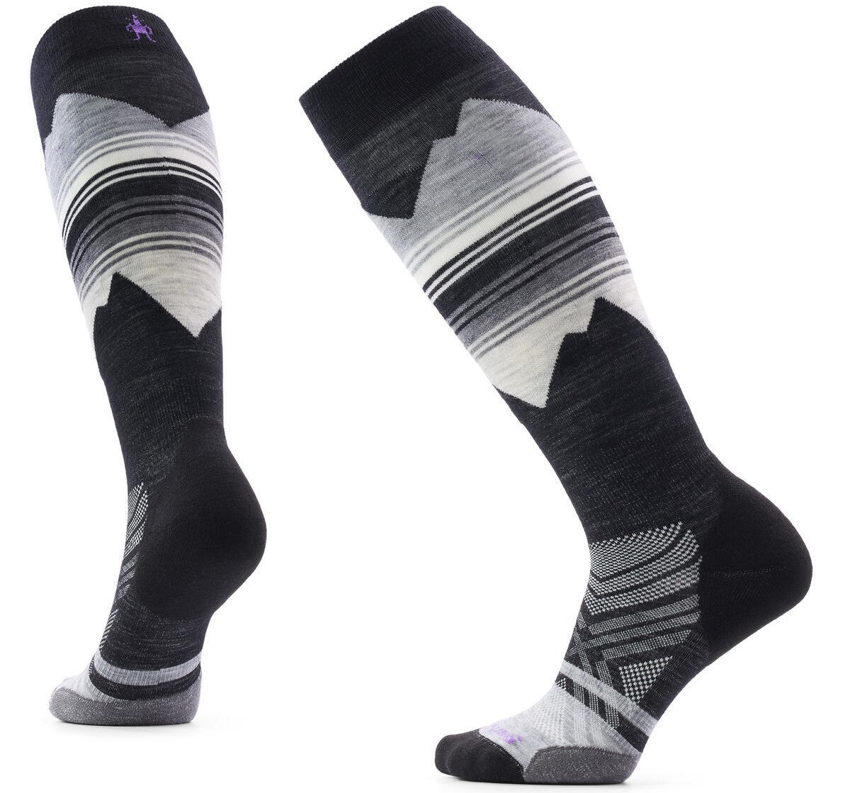 A pair of knee-high performance socks featuring a black and gray color scheme with a graphic mountain range design in white and gray, and striped patterns near the top cuff, showcased from both a side and rear perspective.