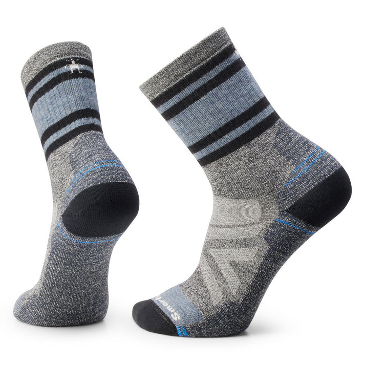 Pair of gray socks with light-blue and black stripes.
