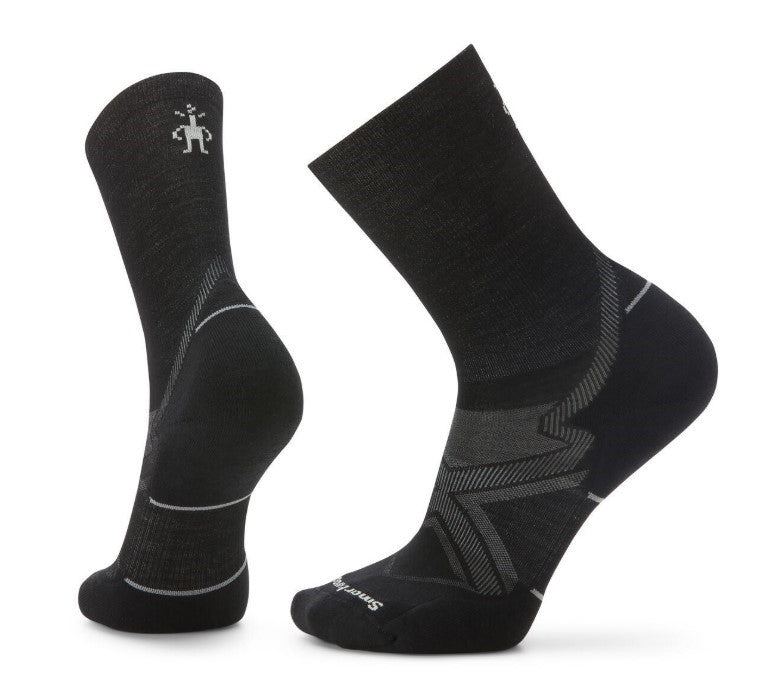 A pair of black crew socks, each featuring gray accent lines and toe and heel reinforcements, with the logo near the top of one sock.