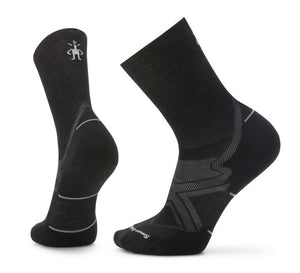 A pair of black crew socks, each featuring gray accent lines and toe and heel reinforcements, with the logo near the top of one sock.