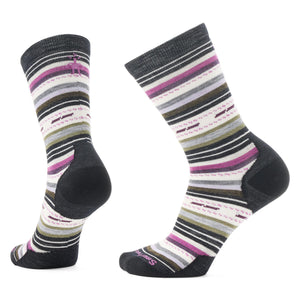 Two striped socks, one standing heel first and the other standing toe first, showcasing stripes in gray, purple, white, black, and green.
