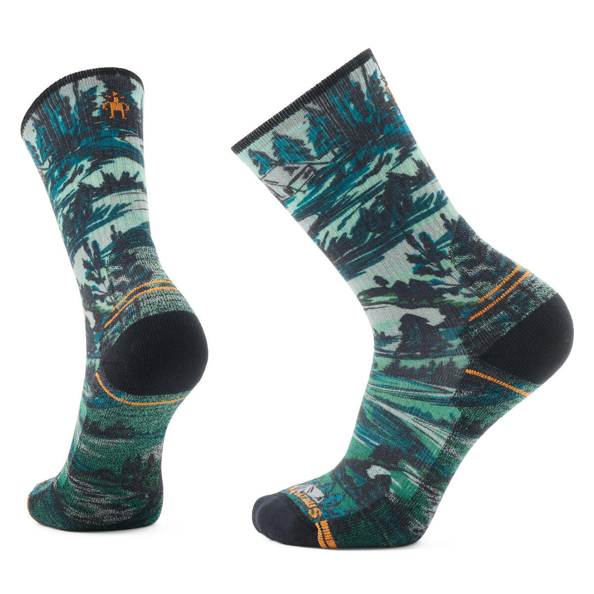 Two crew socks with a forest scene graphic pattern and a black toe and heel.