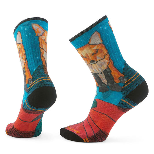 Pair of socks with a fox illustration and red and blue accents.