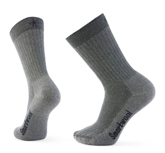 Two gray, wool crew socks, one with ribbing and "Smartwool" written on the foot.