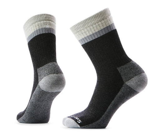 Two black socks with grey toes, heels and cuffs, on white background.