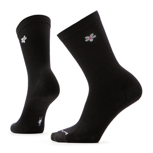 Pair of black socks with a small flower pattern.