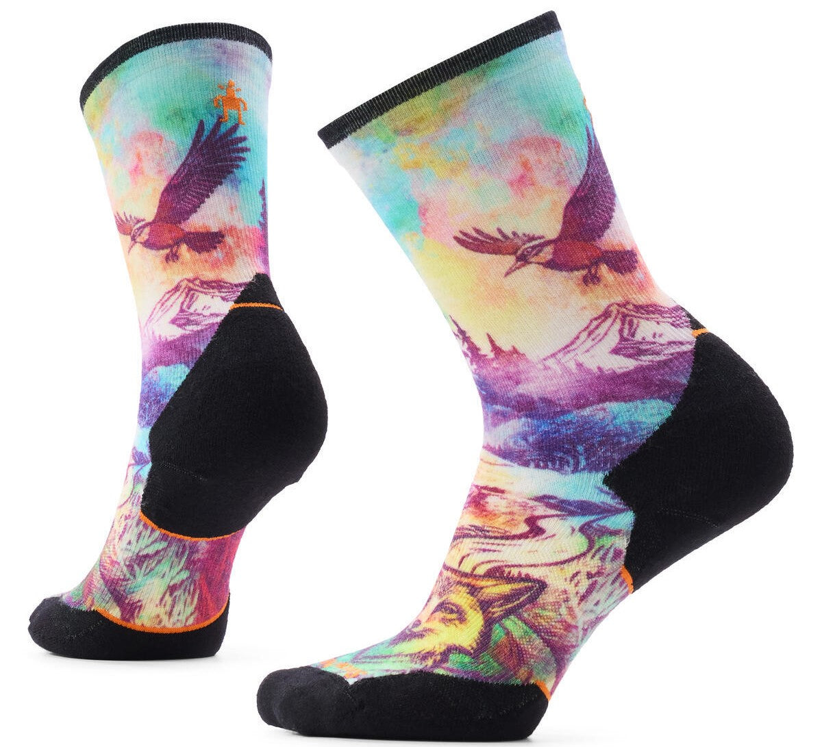 A pair of crew-length athletic socks featuring a colorful, artistic landscape design with a flying bird, mountains, and a wolf, with black fabric at the heels, toes, and ankle cuffs.