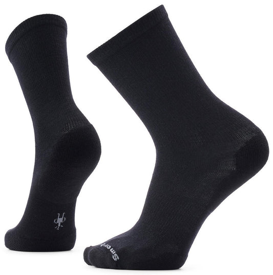 A pair of black mid-calf socks shown from two different angles, featuring a small grey Smartwool logo on the ankle and toe.
