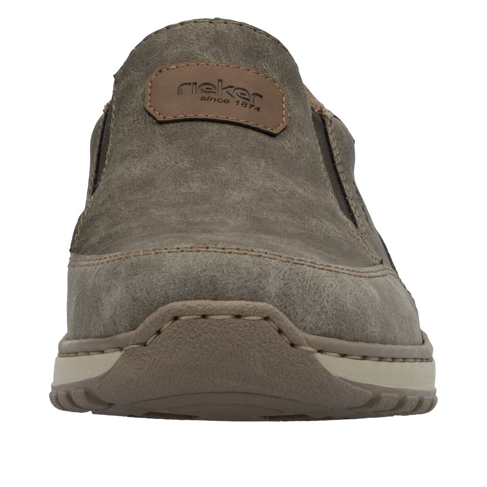 Slip-on shoe with rieker since 1874 label.