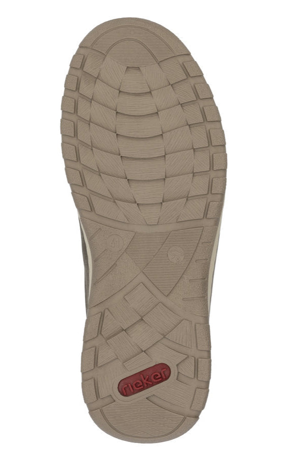 Shoe outsole with brand name 'Rieker' visible in red oval.