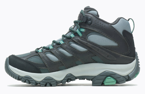 Side view of hiking boot with gray and black leather and teal laces and sole accents.