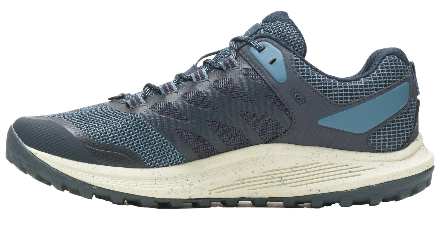 Side view of navy running shoe with a speckled cream sole.