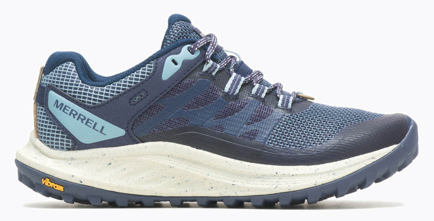 A blue athletic shoe with mesh and speckled white sole, featuring "MERRELL" text on the side and a yellow Vibram logo on the outer sole.