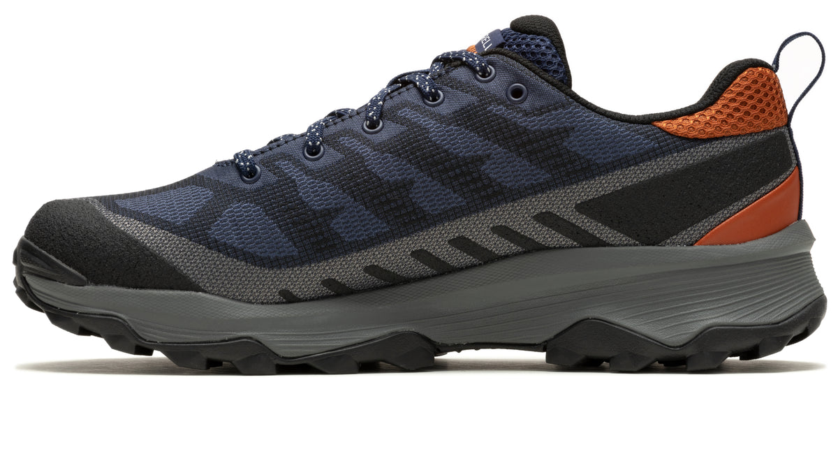 Low-cut hiking shoe with navy and black patterned upper, gray midsole and black lug outsole, and orange heel pull tab.