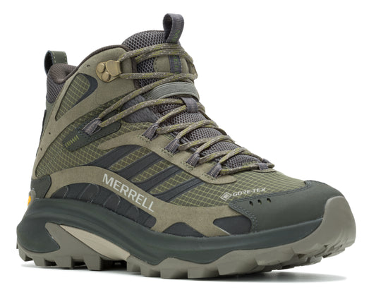 Olive green hiking boot with GORE-TEX label and thick lugged sole.