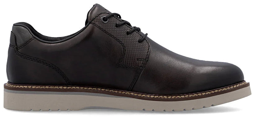 A black leather shoe with a white sole.