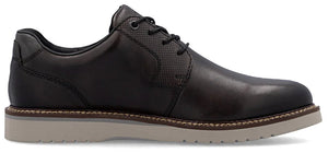 A black leather shoe with a white sole.
