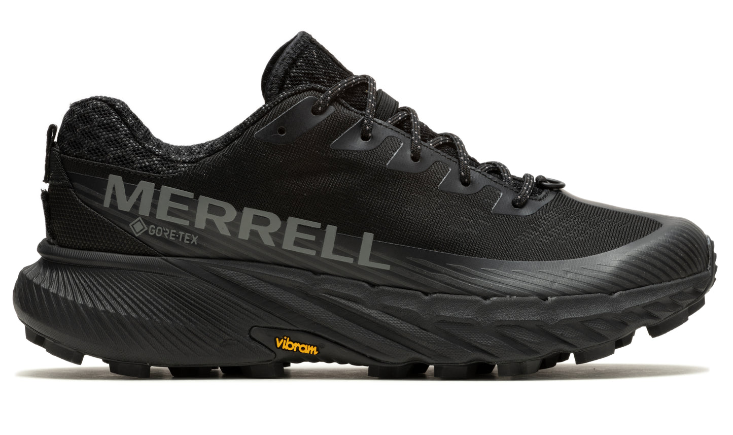 Black athletic shoe with the text "MERRELL GORE-TEX" on the side and a VIBRAM label on the sole.