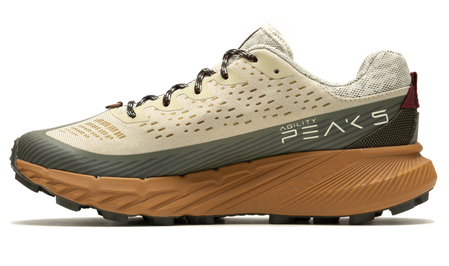 Tan running shoe with dark green lower and brown sole; speckled laces and "AGILITY PEAKS 5" text.