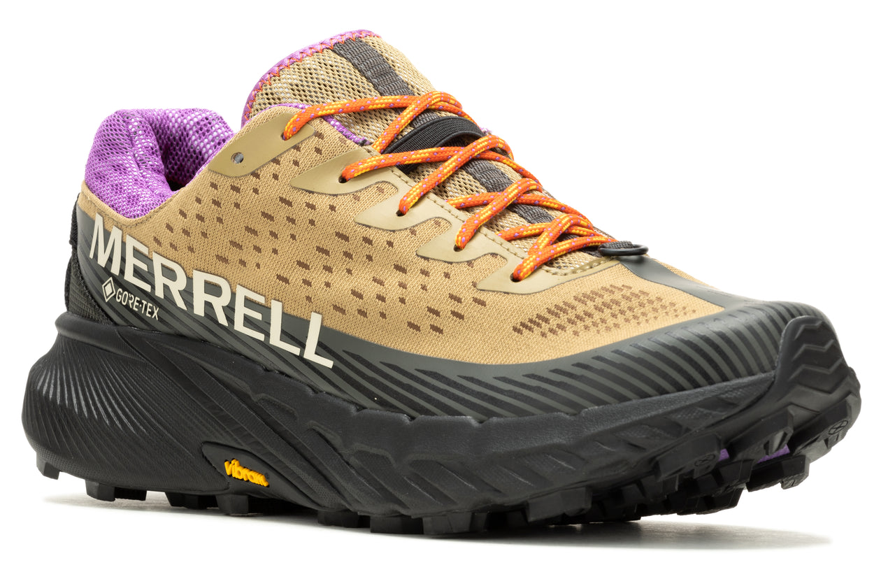 Tan and black running shoe with orange laces and purple collar. "MERRELL GORE-TEX" is printed on the side.