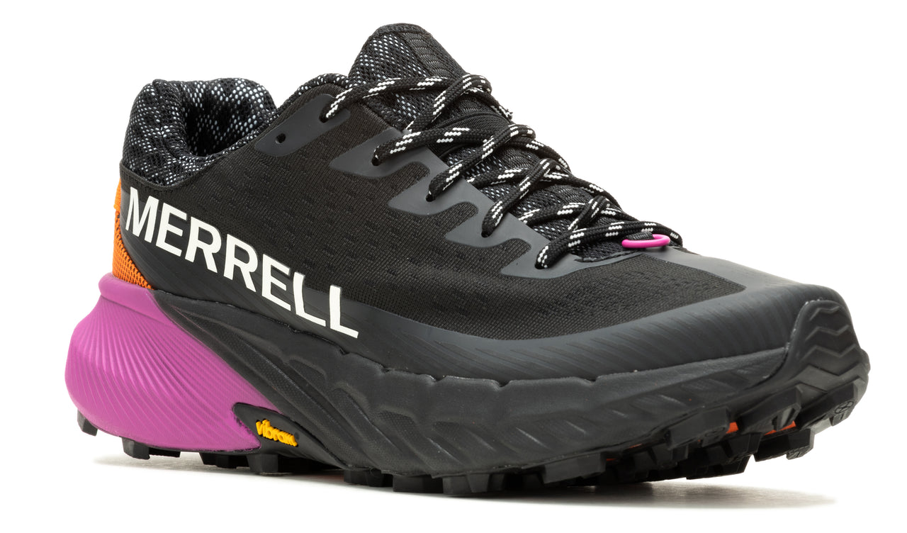 A black running shoe with a wavy purple sole, a Vibram label, and the word "MERRELL" in white.