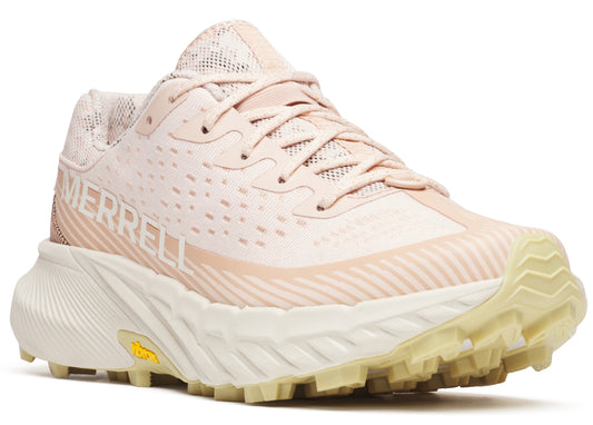 A low-top running shoe with a cream-colored sole and light pink uppers. "MERRELL" is printed on the shoe's side.