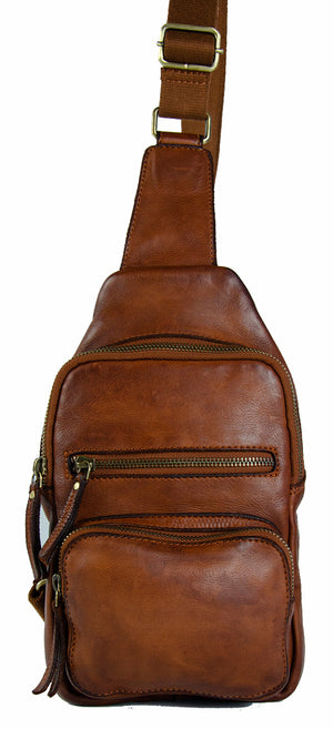 Brown leather sling bag with adjustable strap and multiple zippered compartments.